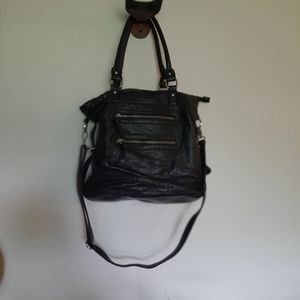 DLG black faux leather purse.